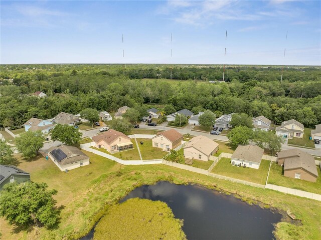5118 Luna Negra Dr, Orlando, FL 32811 - birds eye view of property with a forest view, a residential view, and a water view