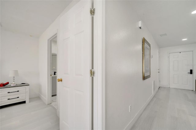5118 Luna Negra Dr, Orlando, FL 32811 - corridor with recessed lighting, baseboards, and light wood-style flooring