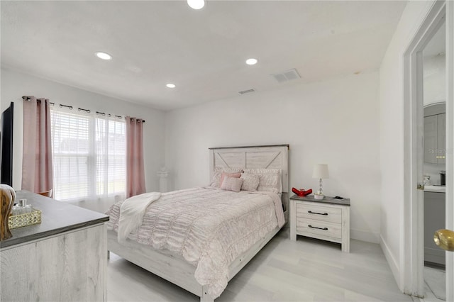 5118 Luna Negra Dr, Orlando, FL 32811 - bedroom featuring baseboards, visible vents, and recessed lighting