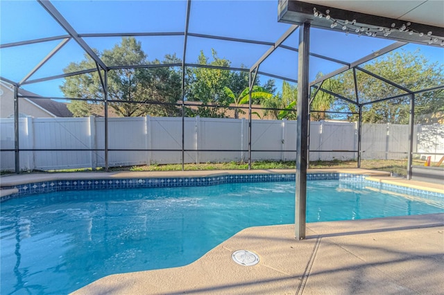 view of pool featuring a fenced backyard, a lanai, and a fenced in pool