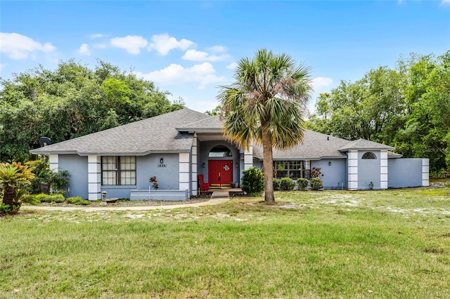 1689 Saboff Way, Chuluota, FL 32766 - ranch-style house featuring stucco siding, a front yard, and a shingled roof