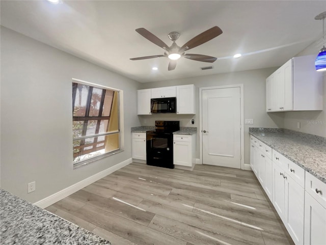 5037 Bermuda Cir Unit 10, Orlando, FL 32808 - kitchen featuring white cabinets, visible vents, recessed lighting, a ceiling fan, and black appliances