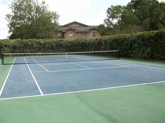 view of sport court with community basketball court and fence