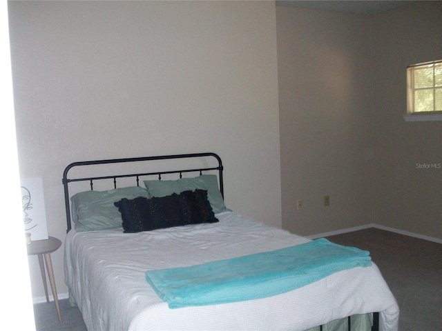 bedroom with baseboards
