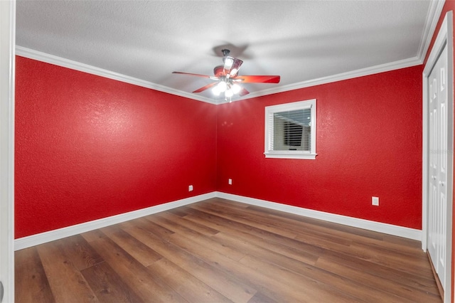 1105 Lake Nettie Dr, Eustis, FL 32726 - empty room with wood finished floors, ceiling fan, crown molding, baseboards, and a textured wall
