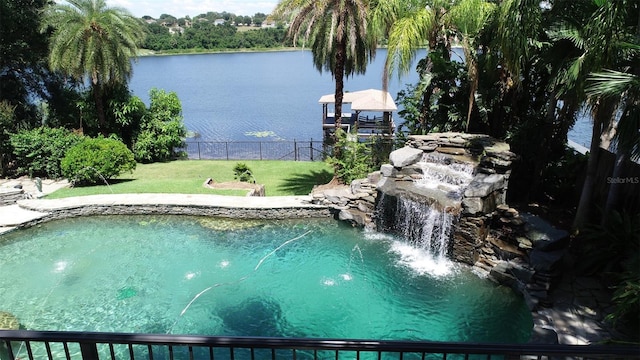 1105 Lake Nettie Dr, Eustis, FL 32726 - view of swimming pool with a water view