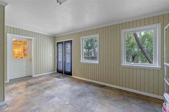 1105 Lake Nettie Dr, Eustis, FL 32726 - entrance foyer with ornamental molding and a textured ceiling
