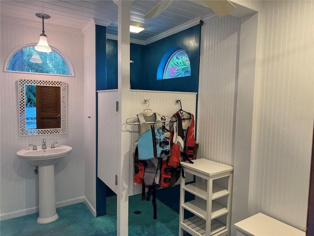 1105 Lake Nettie Dr, Eustis, FL 32726 - bathroom with ornamental molding and a wainscoted wall