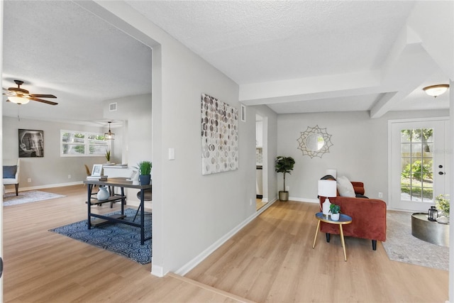 2716 Herrick Dr, Jacksonville, FL 32211 - interior space with light wood-style floors, a textured ceiling, baseboards, and visible vents