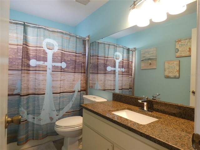 9313 Pavillion Dr, Orlando, FL 32825 - full bathroom with visible vents, vanity, a shower with shower curtain, and toilet