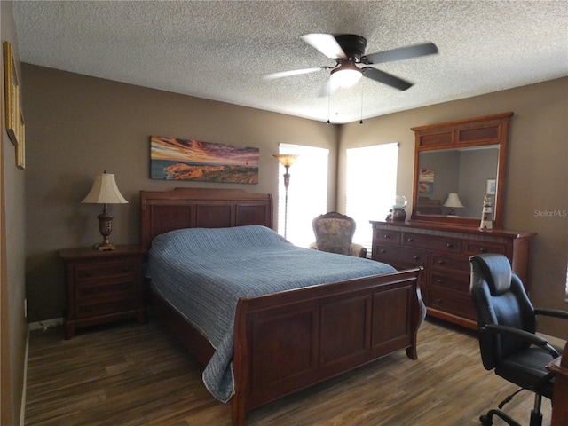 9313 Pavillion Dr, Orlando, FL 32825 - bedroom featuring wood finished floors, a textured ceiling, and ceiling fan