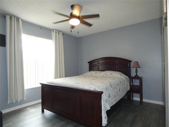 9313 Pavillion Dr, Orlando, FL 32825 - bedroom featuring baseboards, dark wood-style floors, and ceiling fan