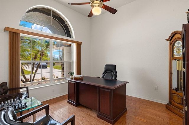 9277 St Paul Dr, Port Charlotte, FL 33981 - office space with a ceiling fan, light wood finished floors, and baseboards