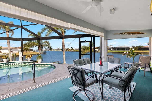 9277 St Paul Dr, Port Charlotte, FL 33981 - view of patio / terrace featuring a ceiling fan, a water view, an outdoor pool, and glass enclosure