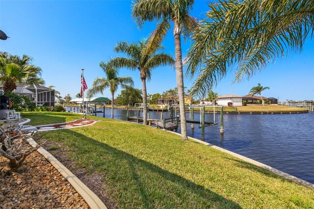 9277 St Paul Dr, Port Charlotte, FL 33981 - dock featuring a water view and a yard