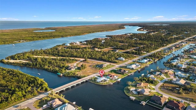 9277 St Paul Dr, Port Charlotte, FL 33981 - aerial overview of property's location featuring a nearby body of water