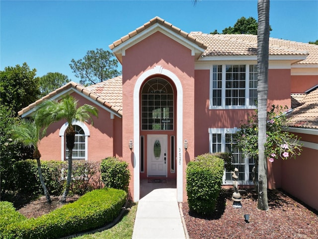 3020 Zaharias Dr, Orlando, FL 32837 - mediterranean / spanish-style home with stucco siding and a tile roof
