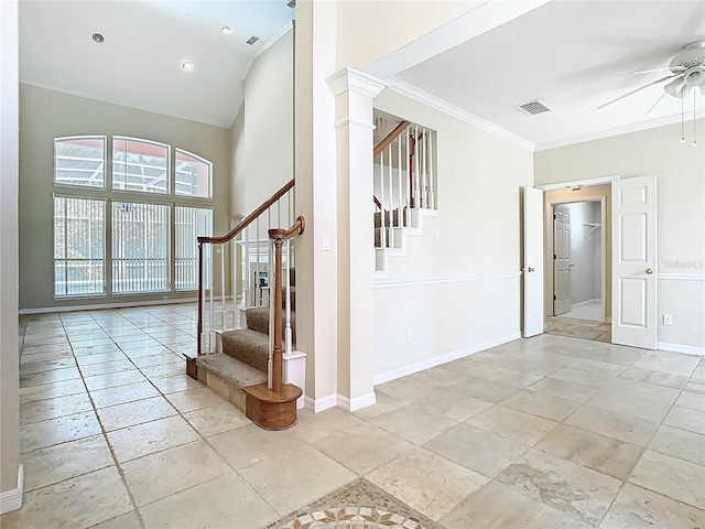 3020 Zaharias Dr, Orlando, FL 32837 - stairway featuring ceiling fan, a high ceiling, baseboards, visible vents, and ornamental molding