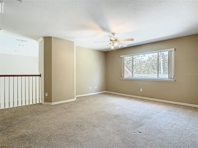 3020 Zaharias Dr, Orlando, FL 32837 - spare room featuring visible vents, carpet flooring, baseboards, a textured ceiling, and a ceiling fan