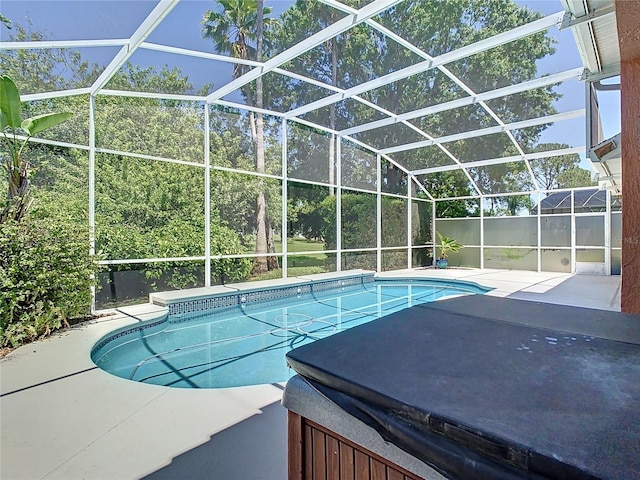 3020 Zaharias Dr, Orlando, FL 32837 - outdoor pool featuring a hot tub, a patio, and glass enclosure
