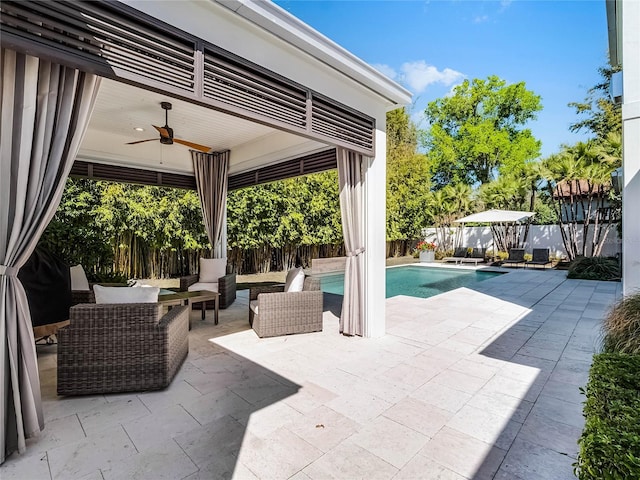 2171 Forrest Rd, Winter Park, FL 32789 - fenced backyard featuring a ceiling fan, a patio, and an outdoor hangout area