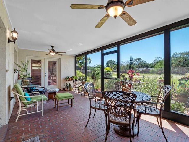 1139 Fairway Dr, Winter Park, FL 32792 - sunroom / solarium featuring a ceiling fan, brick flooring, and outdoor dining area