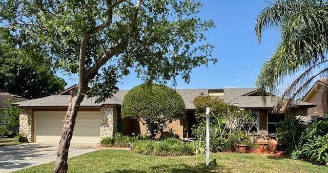 1139 Fairway Dr, Winter Park, FL 32792 - view of front of house with a garage and driveway
