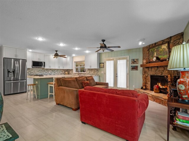 1139 Fairway Dr, Winter Park, FL 32792 - living area featuring ceiling fan, a fireplace, and recessed lighting
