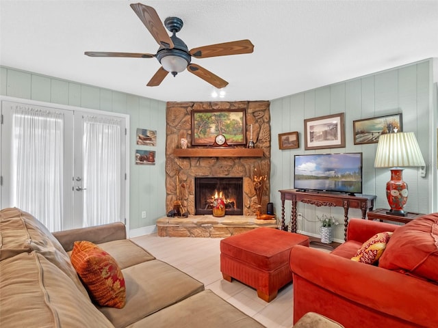 1139 Fairway Dr, Winter Park, FL 32792 - living area featuring ceiling fan and a stone fireplace