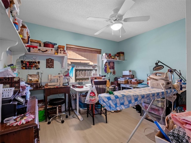 1139 Fairway Dr, Winter Park, FL 32792 - bedroom featuring wood finished floors, a textured ceiling, and ceiling fan