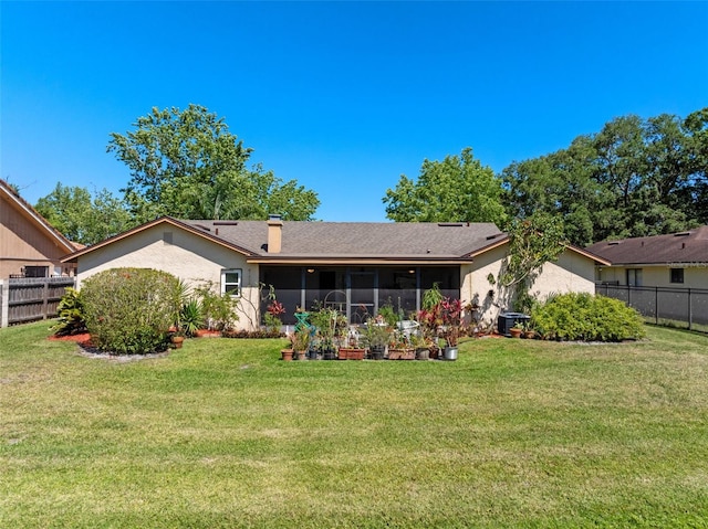 1139 Fairway Dr, Winter Park, FL 32792 - back of house featuring a sunroom, stucco siding, and roof with shingles