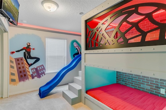 8814 Geneve Ct, Kissimmee, FL 34747 - carpeted bedroom with baseboards and a textured ceiling
