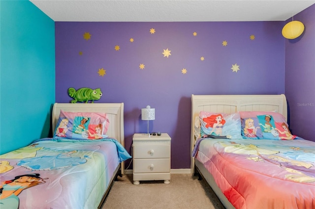 8814 Geneve Ct, Kissimmee, FL 34747 - bedroom with baseboards and light carpet