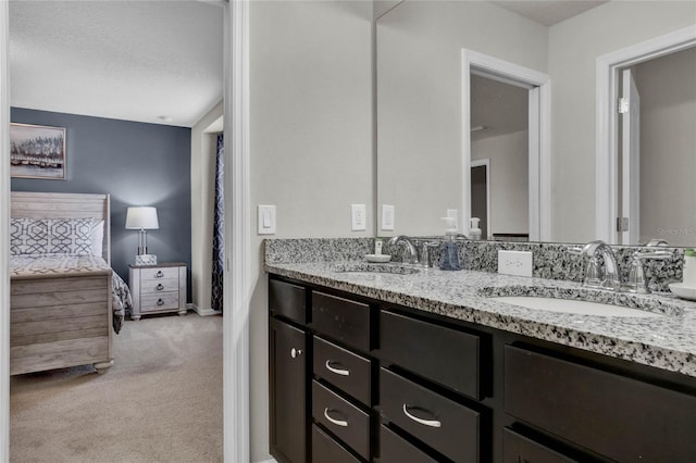 8814 Geneve Ct, Kissimmee, FL 34747 - ensuite bathroom featuring connected bathroom, a sink, and double vanity