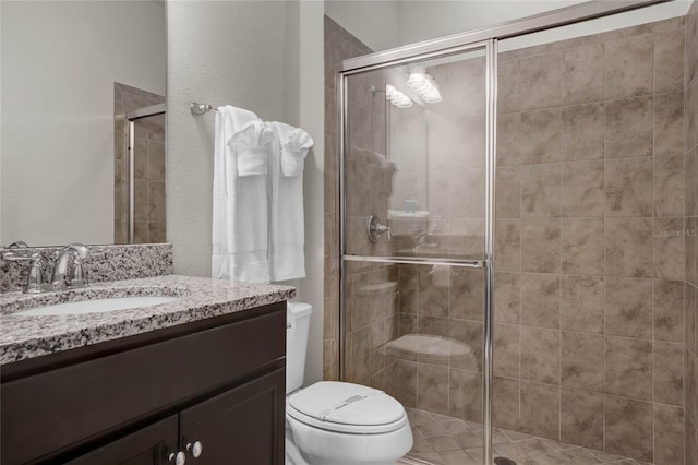8814 Geneve Ct, Kissimmee, FL 34747 - full bathroom with a shower stall, toilet, and vanity