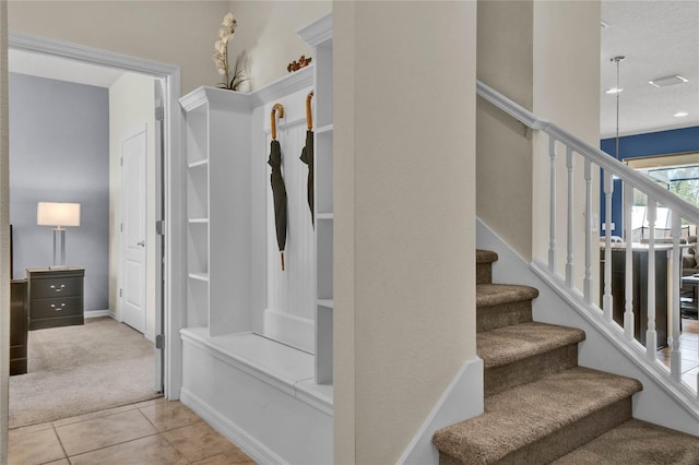 8814 Geneve Ct, Kissimmee, FL 34747 - interior space with carpet flooring and tile patterned floors