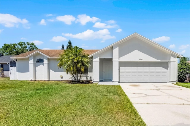 ranch-style home with an attached garage, concrete driveway, a front yard, and stucco siding