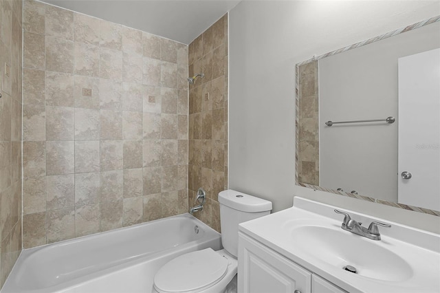bathroom with toilet, vanity, and shower / washtub combination
