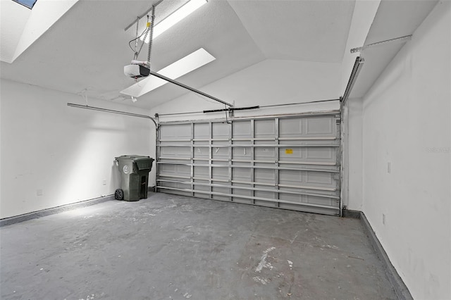 garage featuring baseboards and a garage door opener