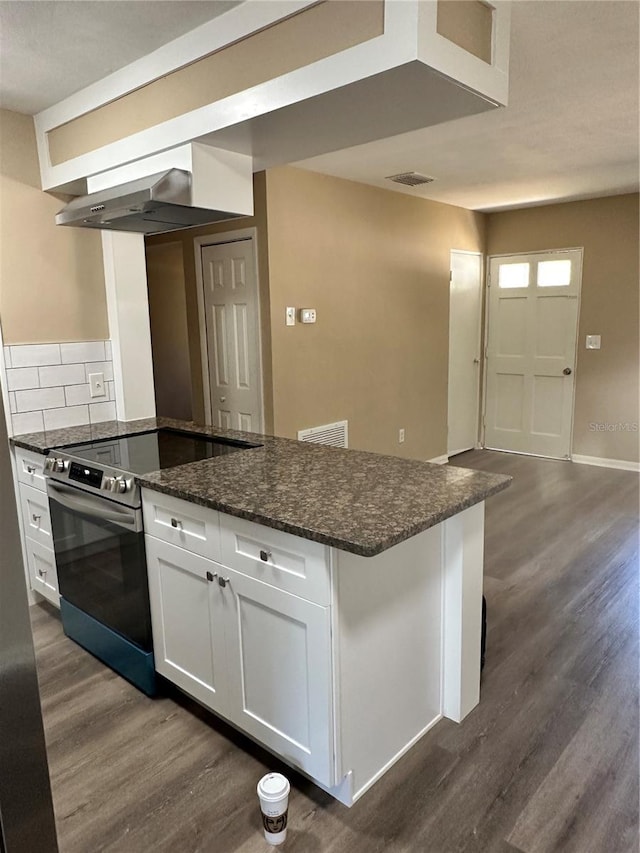 804 Little Wekiwa Dr, Altamonte Springs, FL 32714 - kitchen featuring white cabinets, dark wood finished floors, under cabinet range hood, visible vents, and stainless steel range with electric stovetop