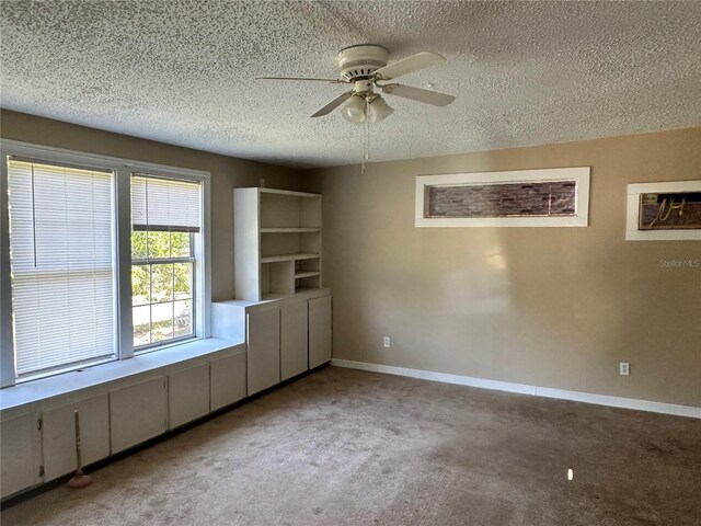 804 Little Wekiwa Dr, Altamonte Springs, FL 32714 - carpeted empty room featuring baseboards, a ceiling fan, a textured ceiling, and a wall unit AC