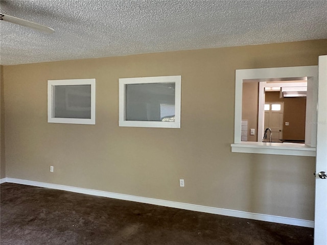 804 Little Wekiwa Dr, Altamonte Springs, FL 32714 - spare room with a ceiling fan, baseboards, and a textured ceiling