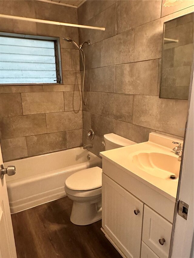 804 Little Wekiwa Dr, Altamonte Springs, FL 32714 - full bathroom featuring toilet, shower / bathtub combination, vanity, and wood finished floors