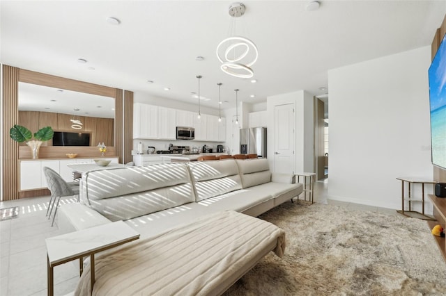 646 Longboat Dr, Davenport, FL 33896 - living area with recessed lighting, a notable chandelier, and light tile patterned floors