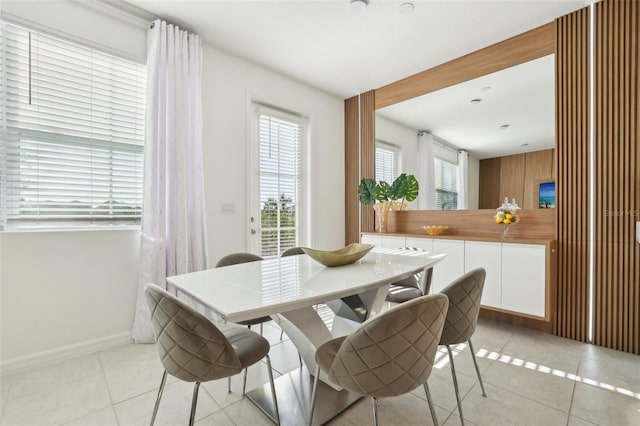 646 Longboat Dr, Davenport, FL 33896 - dining room with baseboards and light tile patterned floors