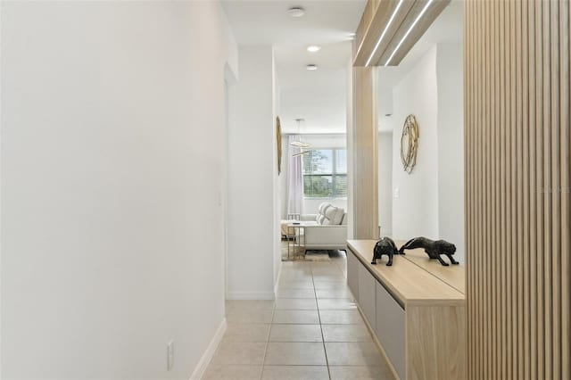 646 Longboat Dr, Davenport, FL 33896 - hall with baseboards and light tile patterned floors