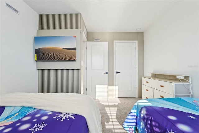 646 Longboat Dr, Davenport, FL 33896 - bedroom with visible vents and carpet floors