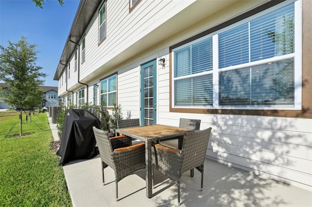 646 Longboat Dr, Davenport, FL 33896 - view of patio / terrace featuring outdoor dining area and area for grilling
