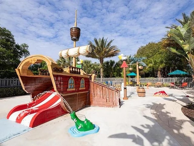 646 Longboat Dr, Davenport, FL 33896 - community playground featuring fence