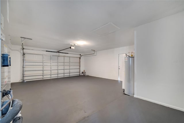 garage with water heater and a garage door opener